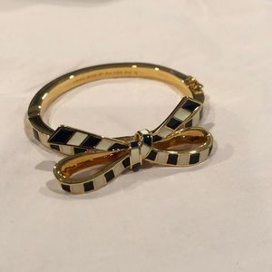 Kate Spade navy and cream bow clasp bangle